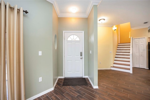 1801 Highland Rd, Osprey, FL 34229 - foyer entrance with wood finish floors, crown molding, and stairway