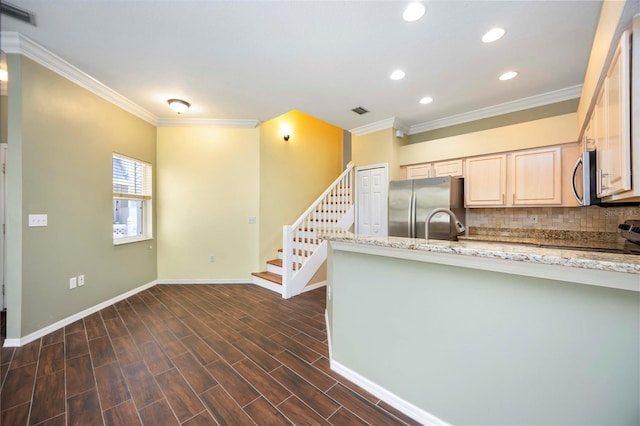 1801 Highland Rd, Osprey, FL 34229 - kitchen with appliances with stainless steel finishes, tasteful backsplash, ornamental molding, recessed lighting, and light stone counters