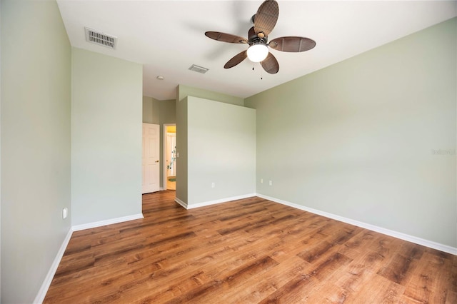 1801 Highland Rd, Osprey, FL 34229 - spare room featuring wood finished floors and a ceiling fan