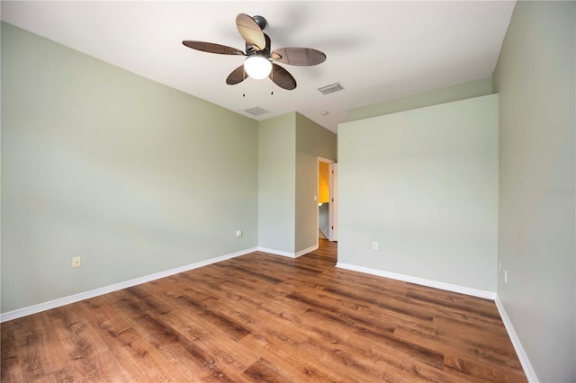 1801 Highland Rd, Osprey, FL 34229 - unfurnished room with wood finished floors and a ceiling fan