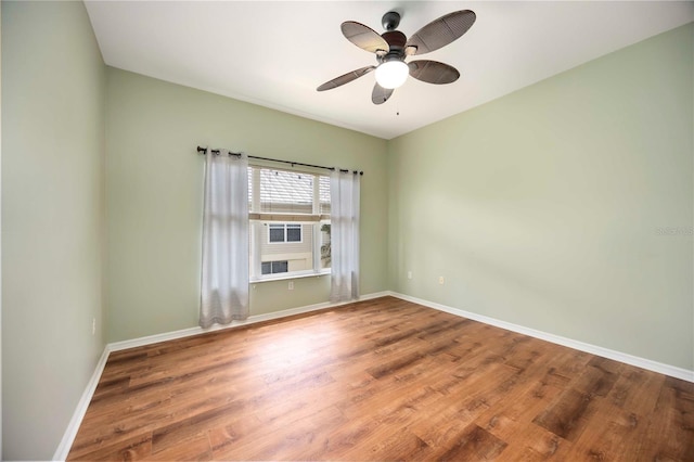 1801 Highland Rd, Osprey, FL 34229 - unfurnished room featuring wood finished floors and a ceiling fan