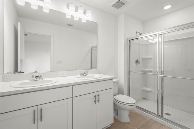 8705 Winter Breeze Way, Sarasota, FL 34241 - bathroom with double vanity, a shower stall, tile patterned flooring, and recessed lighting