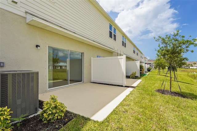 8705 Winter Breeze Way, Sarasota, FL 34241 - rear view of property with a patio and stucco siding