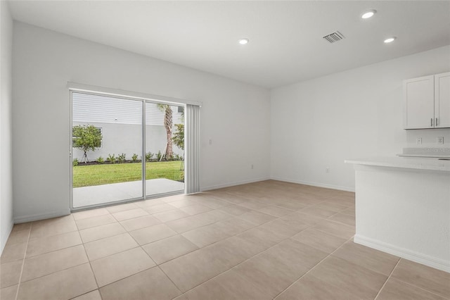 8705 Winter Breeze Way, Sarasota, FL 34241 - unfurnished room with recessed lighting and light tile patterned floors