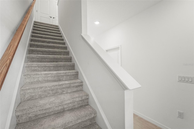 8705 Winter Breeze Way, Sarasota, FL 34241 - staircase with baseboards and recessed lighting