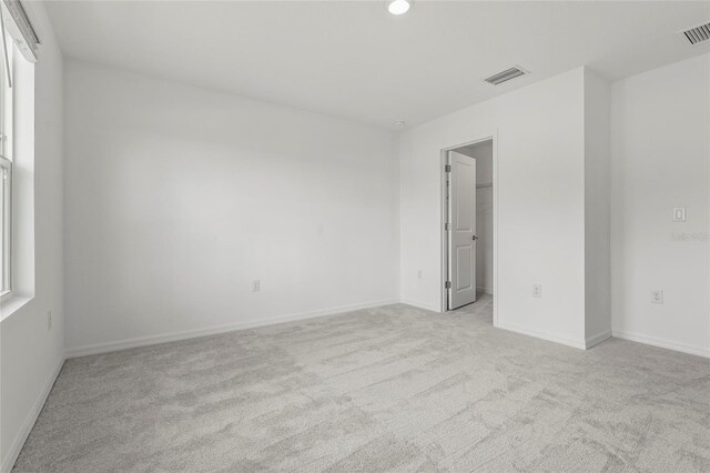 8705 Winter Breeze Way, Sarasota, FL 34241 - empty room featuring light carpet