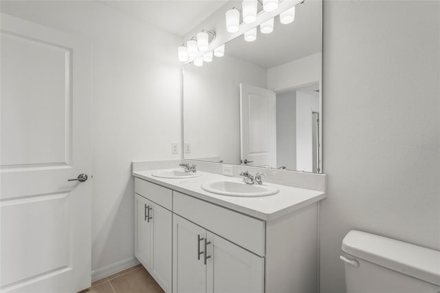 8705 Winter Breeze Way, Sarasota, FL 34241 - bathroom with double vanity and tile patterned flooring
