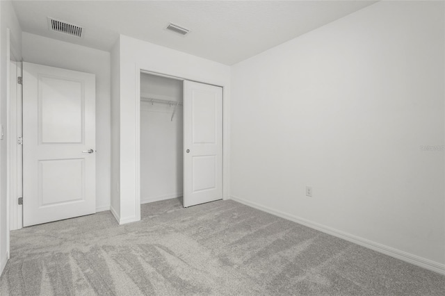 8705 Winter Breeze Way, Sarasota, FL 34241 - unfurnished bedroom featuring carpet flooring and a closet