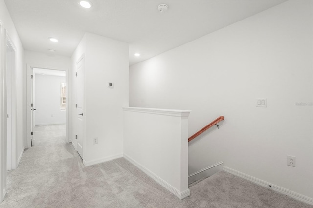 8705 Winter Breeze Way, Sarasota, FL 34241 - corridor featuring an upstairs landing, carpet, and recessed lighting