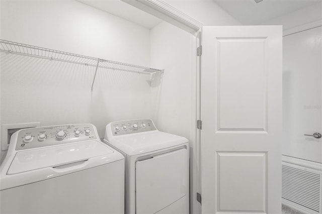 8705 Winter Breeze Way, Sarasota, FL 34241 - washroom featuring washing machine and clothes dryer