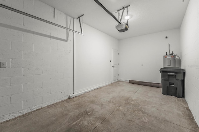8705 Winter Breeze Way, Sarasota, FL 34241 - garage with a garage door opener, concrete block wall, and water heater