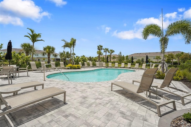 8705 Winter Breeze Way, Sarasota, FL 34241 - community pool featuring a patio area