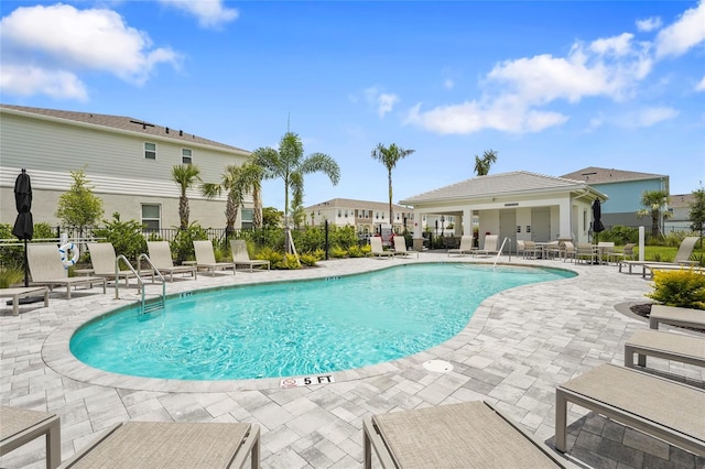 8705 Winter Breeze Way, Sarasota, FL 34241 - community pool featuring a patio