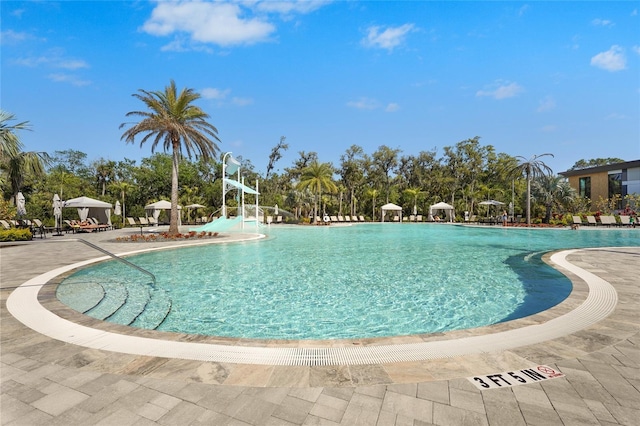 8705 Winter Breeze Way, Sarasota, FL 34241 - community pool featuring a patio