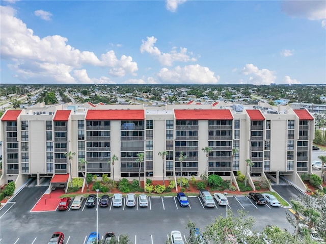 21405 Olean Blvd Unit 224, Port Charlotte, FL 33952 - view of apartment building / complex featuring uncovered parking