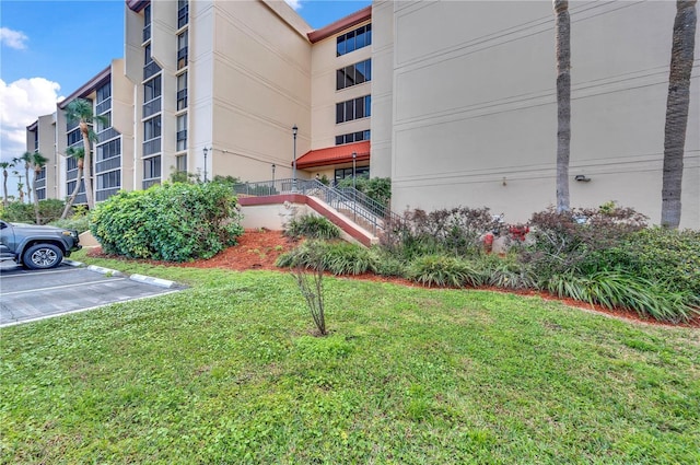 21405 Olean Blvd Unit 224, Port Charlotte, FL 33952 - view of building exterior with uncovered parking