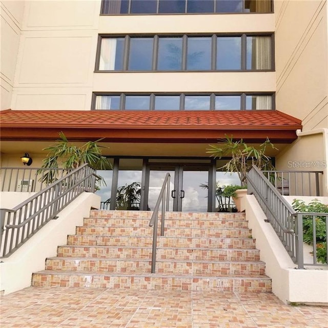 21405 Olean Blvd Unit 224, Port Charlotte, FL 33952 - entrance to property featuring stucco siding
