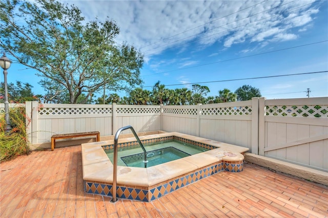 21405 Olean Blvd Unit 224, Port Charlotte, FL 33952 - view of swimming pool featuring an in-ground hot tub and a wooden deck