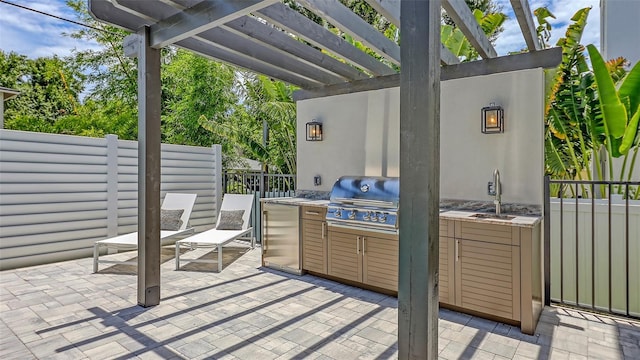 2590 Floyd St, Sarasota, FL 34239 - view of patio / terrace featuring an outdoor kitchen and a pergola