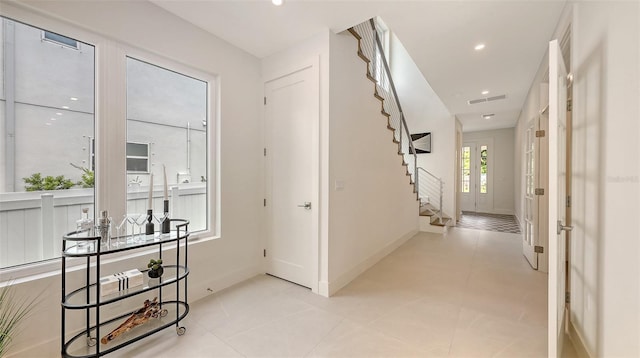 2590 Floyd St, Sarasota, FL 34239 - corridor with stairway and recessed lighting