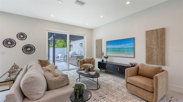 2590 Floyd St, Sarasota, FL 34239 - living area featuring baseboards and recessed lighting