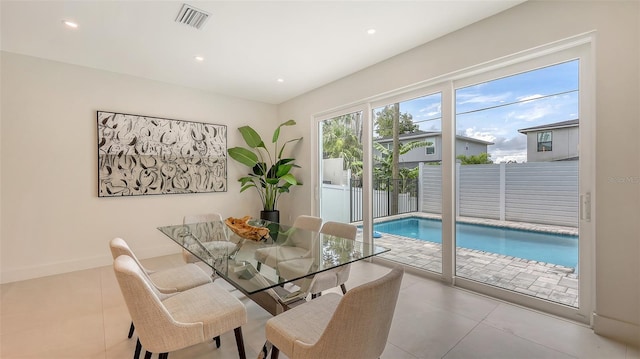 2590 Floyd St, Sarasota, FL 34239 - dining area featuring recessed lighting and tile patterned flooring