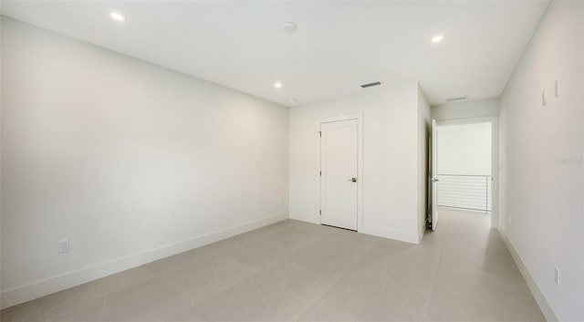 2590 Floyd St, Sarasota, FL 34239 - unfurnished bedroom with recessed lighting and light tile patterned flooring
