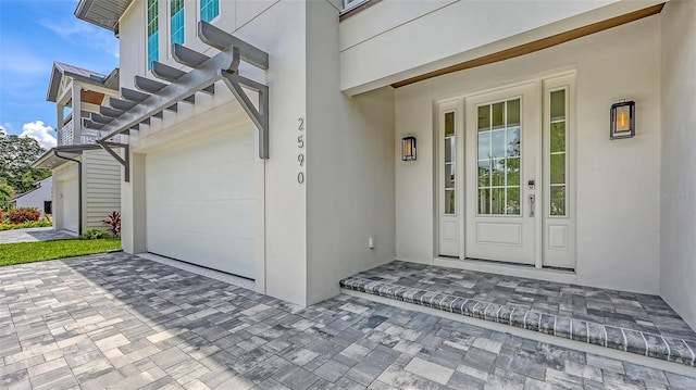 2590 Floyd St, Sarasota, FL 34239 - view of exterior entry with stucco siding