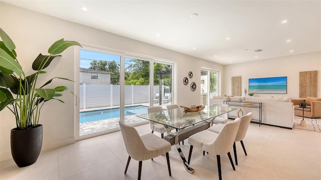 2590 Floyd St, Sarasota, FL 34239 - dining area with light tile patterned flooring and recessed lighting