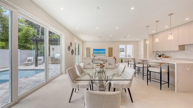 2590 Floyd St, Sarasota, FL 34239 - dining space with recessed lighting and light tile patterned floors