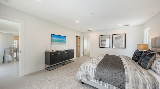 2590 Floyd St, Sarasota, FL 34239 - bedroom with light tile patterned floors and recessed lighting