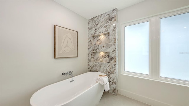 2590 Floyd St, Sarasota, FL 34239 - bathroom featuring a freestanding tub
