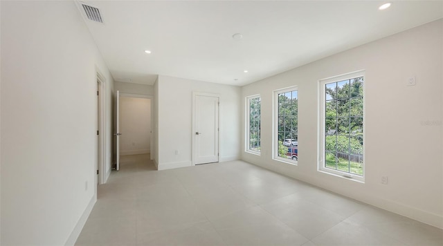 2590 Floyd St, Sarasota, FL 34239 - unfurnished bedroom featuring baseboards and recessed lighting