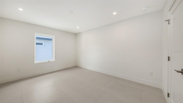2590 Floyd St, Sarasota, FL 34239 - empty room with recessed lighting, a smoke detector, and light tile patterned floors