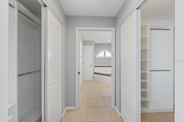 5206 19th Ave W, Bradenton, FL 34209 - hall with light tile patterned floors