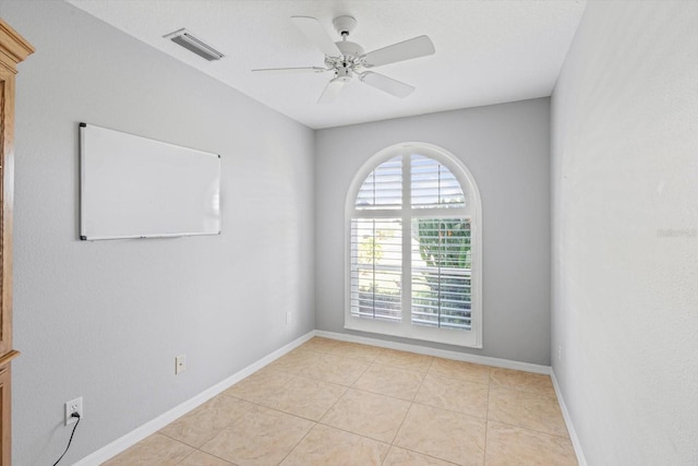 5206 19th Ave W, Bradenton, FL 34209 - unfurnished room featuring light tile patterned floors and a ceiling fan