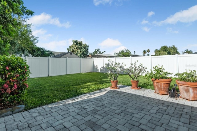5206 19th Ave W, Bradenton, FL 34209 - fenced backyard with a patio area