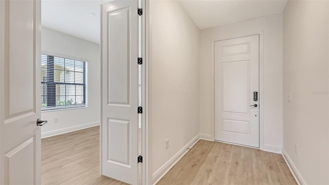 248 Altamura Cir, Nokomis, FL 34275 - corridor with light wood finished floors