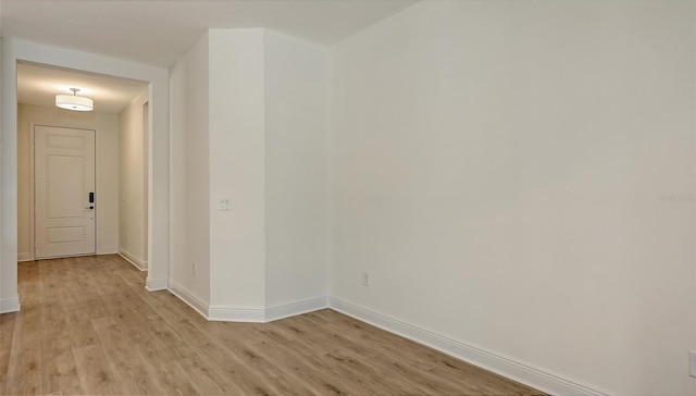 248 Altamura Cir, Nokomis, FL 34275 - empty room featuring light wood-style flooring and baseboards