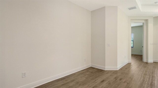 248 Altamura Cir, Nokomis, FL 34275 - unfurnished room featuring wood finished floors and a smoke detector