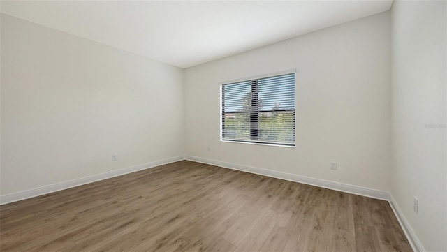 248 Altamura Cir, Nokomis, FL 34275 - empty room with light wood-type flooring and baseboards