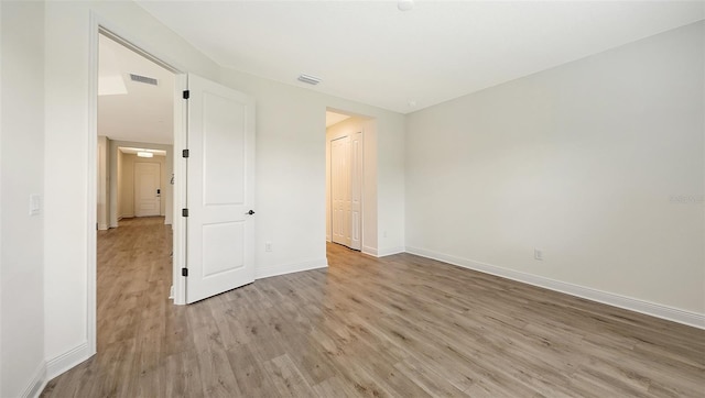 248 Altamura Cir, Nokomis, FL 34275 - unfurnished bedroom with light wood-style flooring and baseboards