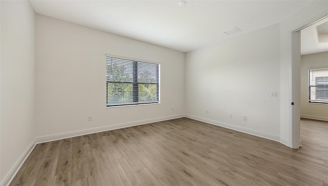 248 Altamura Cir, Nokomis, FL 34275 - spare room with plenty of natural light and light wood-type flooring