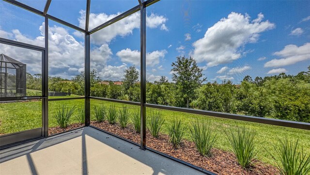 248 Altamura Cir, Nokomis, FL 34275 - unfurnished sunroom featuring healthy amount of natural light