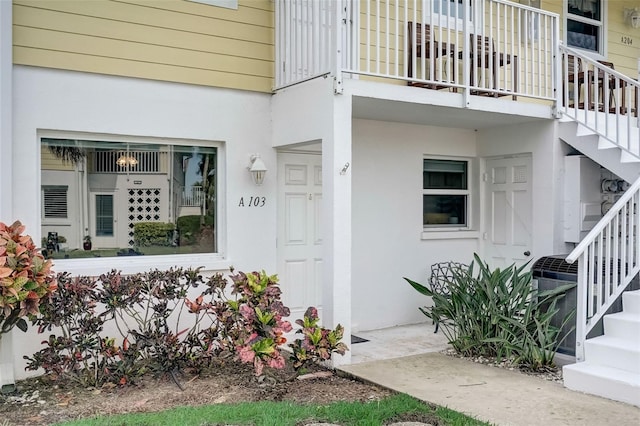 999 Inlet Cir Unit 103, Venice, FL 34285 - property entrance with stucco siding