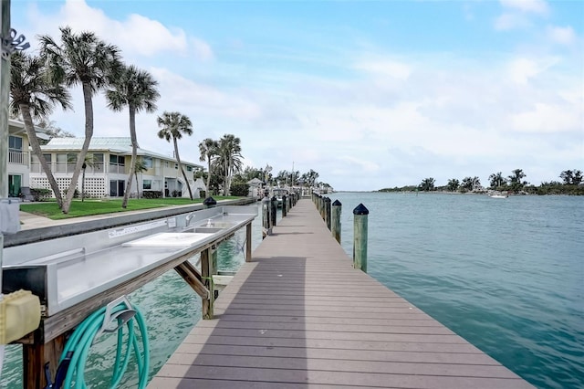 999 Inlet Cir Unit 103, Venice, FL 34285 - dock area featuring a water view