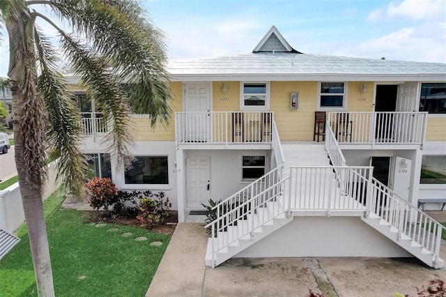 999 Inlet Cir Unit 103, Venice, FL 34285 - view of property featuring stairway