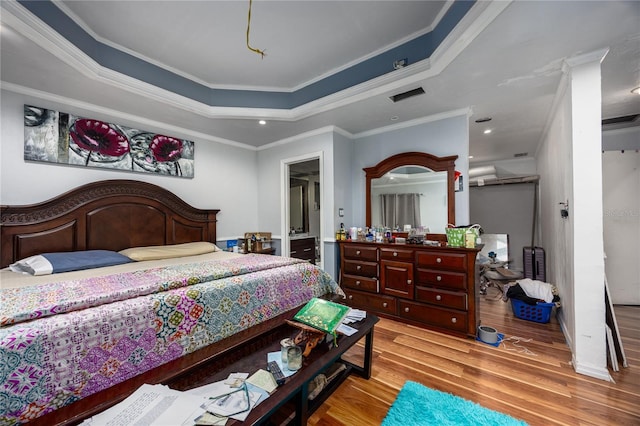 4310 NW 65th Ter, Gainesville, FL 32606 - bedroom with wood finished floors, ornamental molding, and recessed lighting