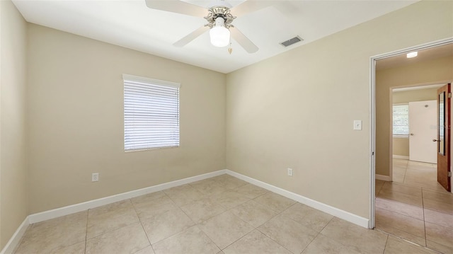 2088 Grove St, Sarasota, FL 34239 - empty room featuring ceiling fan and light tile patterned floors