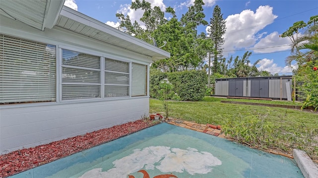 2088 Grove St, Sarasota, FL 34239 - view of patio with a storage unit